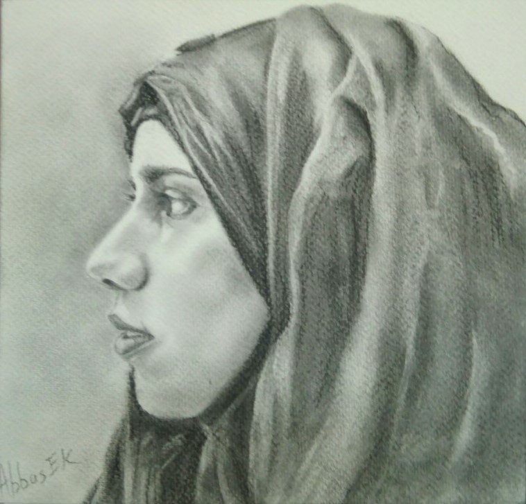 Charcoal portrait of a girl wearing a hijab