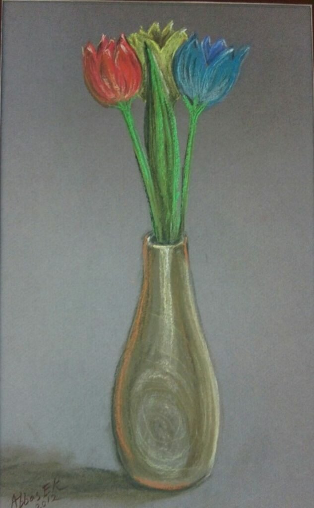 Still-life of three tulips in a jar