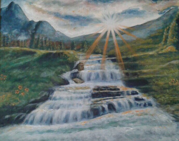 Landscape showing a long flowing waterfall